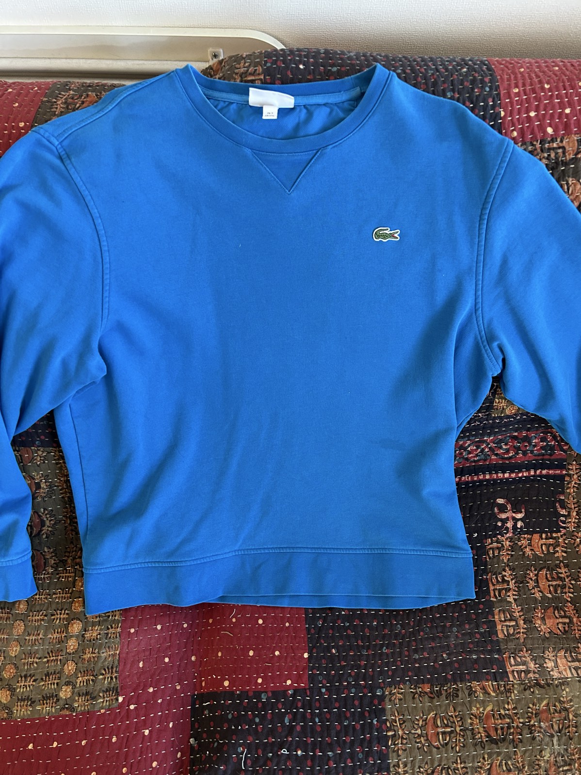 Poleron Lacoste